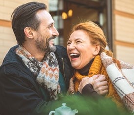 Couple laughing after successful erectile dysfunction treatment
